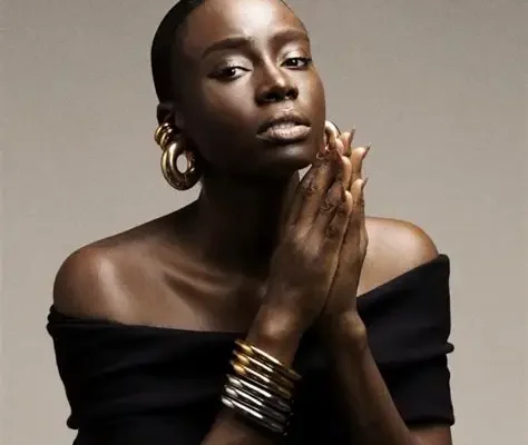 Sarah Diouf Biography: Education, Career and the Tongoro Story Few African fashion founders have started by launching magazines, and fewer still have dressed Beyoncé within two years of opening a brand. This Sarah Diouf biography follows a Paris-born, Abidjan-raised entrepreneur who left a career in publishing to build Tongoro, a label designed and produced entirely in Dakar, Senegal. She trained in marketing and communication, not fashion design, and she built the brand on a business idea: make premium African clothing that people can afford, and make it where the craftspeople live. Her story offers a practical case study in fashion entrepreneurship, brand building and international visibility. This article covers her education, career and the strategy behind her company. Who Is Sarah Diouf? Sarah Diouf is a Senegalese entrepreneur, designer and storyteller, and the founder and creative director of Tongoro. She was born in Paris to a Senegalese-Congolese father and a mother of Senegalese and Central African origin, and she grew up in Abidjan, Côte d’Ivoire. Her parents’ work let the family travel, and she describes that exposure as an education in its own right. She now lives and works in Dakar. Early Life Between Paris and Abidjan Diouf spent her childhood in Abidjan until the Christmas 1999 coup d’état in Côte d’Ivoire, which pushed her back toward France. She went to live with an aunt and continued her schooling there, an experience she calls a new beginning. A serious accident later confined her to bed in a neck brace for a long recovery, and she says it changed how she saw her life and fed her interest in creativity and storytelling. Sarah Diouf’s Education Diouf earned a master’s degree in marketing and communication management from INSEEC in Paris, studying there from 2007 to 2011. She did not attend a fashion school, and she says so plainly: “I didn’t attend fashion school, but I went to business school.” That background shaped everything she built later. A marketing and communication degree teaches positioning, branding and storytelling, which are skills that many talented designers struggle to learn after launch. First Ventures: Ghubar and NOIR Diouf began her career in media. In 2009, while still a student, she founded Ghubar, a quarterly digital publication that promoted African and Arab fashion and arts. The magazine won her the Online Fashion and Style Initiative award at the Cosmopolitan Style Awards in 2010. In 2015, she followed it with NOIR, a bi-annual lifestyle magazine connecting Black women around the world. Both publications taught her how to build an audience, work with designers and photographers, and tell visual stories, and they gave her a network inside the fashion industry before she made a single garment. Launching Tongoro in Dakar In 2016, Diouf moved to Dakar and launched Tongoro. The name means “star” in Sango, the national language of the Central African Republic. She started with an online retail platform and an apparel brand that promoted Senegalese craftsmanship and the Made in Africa label, and she aimed to position it as a premium brand that people could still afford. Her early identity was cautious. She did not want to call herself a designer, out of respect for people who had studied fashion formally, and she described herself as a creative who loves telling stories. Today she calls herself a fashion entrepreneur. How Tongoro Works Tongoro designs and produces its clothing in Dakar. The brand sources materials on the African continent and works with local artisans and tailors, which supports local jobs and keeps the supply chain close to its customers. Diouf frames this as ethical, sustainable fashion and as proof that African production can meet international standards. The brand’s look is distinctive. Diouf drew on the black-and-white photography of 1960s African photographers to create a monochrome palette that people now associate with Tongoro. She says that working only in black and white was something she thought no African fashion label had done. International Visibility The brand’s breakthrough came in 2018, when Beyoncé wore Tongoro and introduced it to a global audience. Since then, Alicia Keys, Naomi Campbell and Burna Boy have also worn its pieces, and Fast Company listed Tongoro among its most innovative companies in 2020. The brand also launched an exclusive capsule collection with the online retailer Industrie Africa in December 2020. This visibility matters as a business strategy. Celebrity wear created demand that a young label could not afford to buy through advertising, and it brought attention to the Made in Africa claim. Expanding Into Menswear Tongoro has also moved beyond womenswear. Diouf launched Môgô, a menswear collection whose name means “guy” in Ivorian Nouchi, and it includes clothing for Burna Boy. The expansion widens the brand’s customer base and shows that the label can design for different audiences while keeping its identity. Defending African Design In January 2024, Diouf publicly accused the French fashion house Balmain of plagiarism, a claim that drew international attention. The episode highlighted a problem that African designers face: strong ideas can be copied by larger houses that have more money and reach. By speaking out, Diouf positioned Tongoro as a brand that protects its creative work. Building a Recognisable African Brand Three elements stand out in how Diouf built Tongoro. The first is a clear point of view. Black-and-white prints, bold silhouettes and a focus on everyday glamour make the brand easy to recognise. The second is a place-based identity. Dakar production and Senegalese craft give the Made in Africa label substance beyond a slogan. The third is storytelling, a skill she developed through years in publishing. Each collection carries a narrative, and she communicates it through photography and social media. She also treats affordability as part of the brand’s promise. Her aim has been premium quality that a young professional can buy, and not luxury that only a few can reach. Why Sarah Diouf Draws Attention Her profile blends several unusual features: a founder who started in media, a brand that grew from an online platform into a label worn by global stars, and a production model rooted in Dakar. Readers who search for a Sarah Diouf biography want to understand how someone without fashion school training built an internationally recognised African label. What Her Journey Teaches Three lessons stand out. First, skills from one field can launch a business in another. Her marketing training and years in publishing gave her tools that many designers lack. Second, a clear identity makes a brand memorable. Tongoro’s black-and-white palette and Made in Africa focus help customers recognise it instantly. Third, local production creates both authenticity and impact. Working with Dakar artisans strengthens the product and supports the community that makes it.